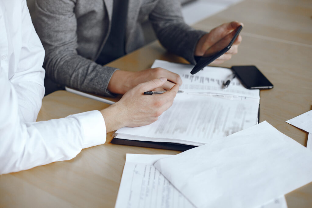 Business Men Sitting Lawyers S Desk People Signing Important Documents 1024x683
